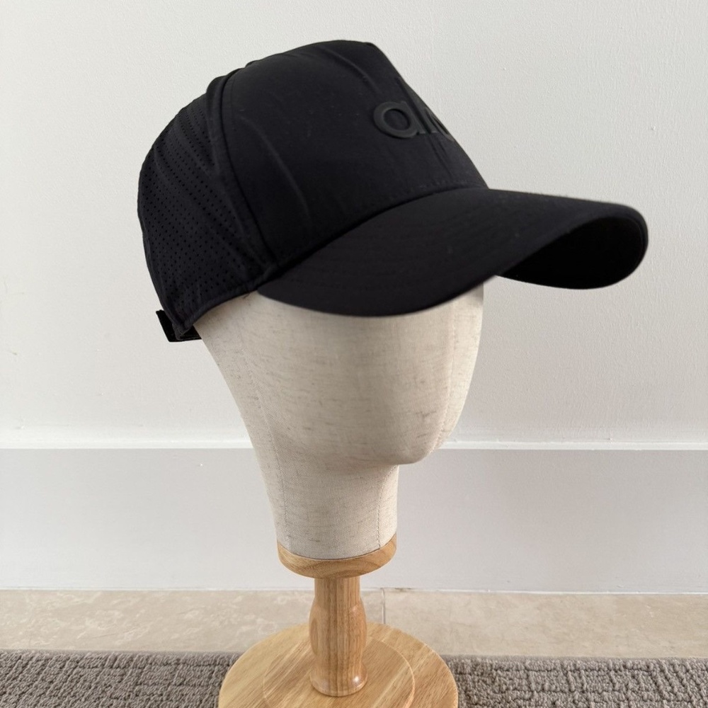 Alo Performance District Trucker Hat - $78